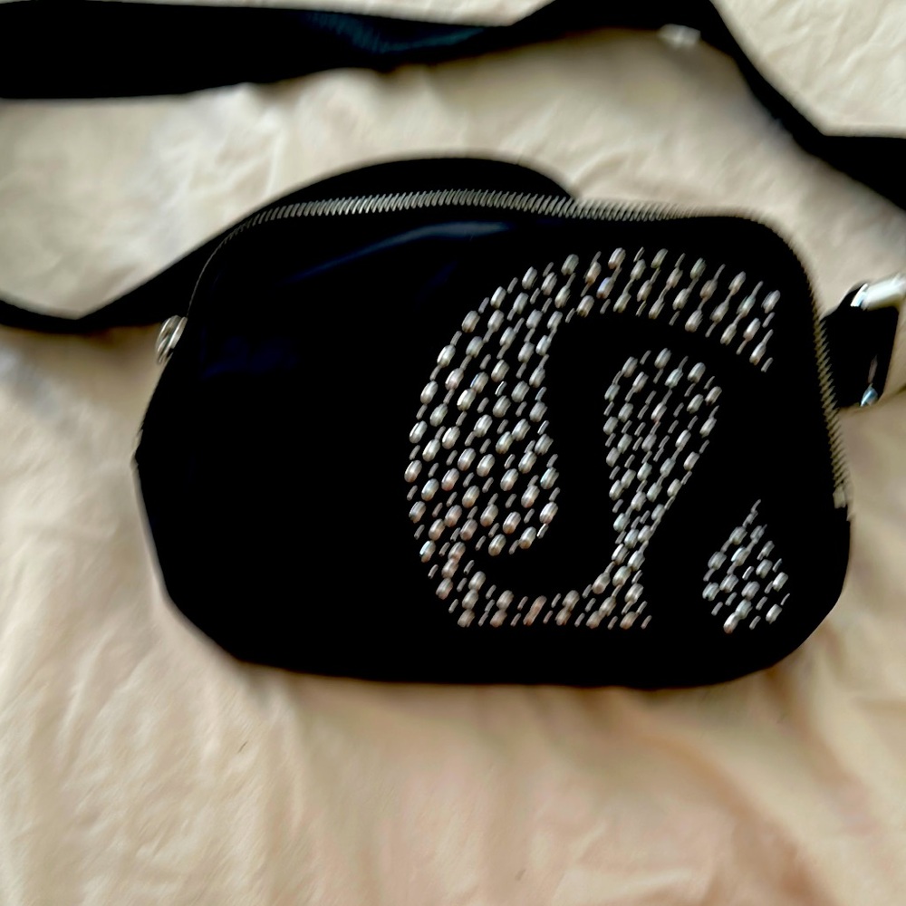 Sling bag with studs